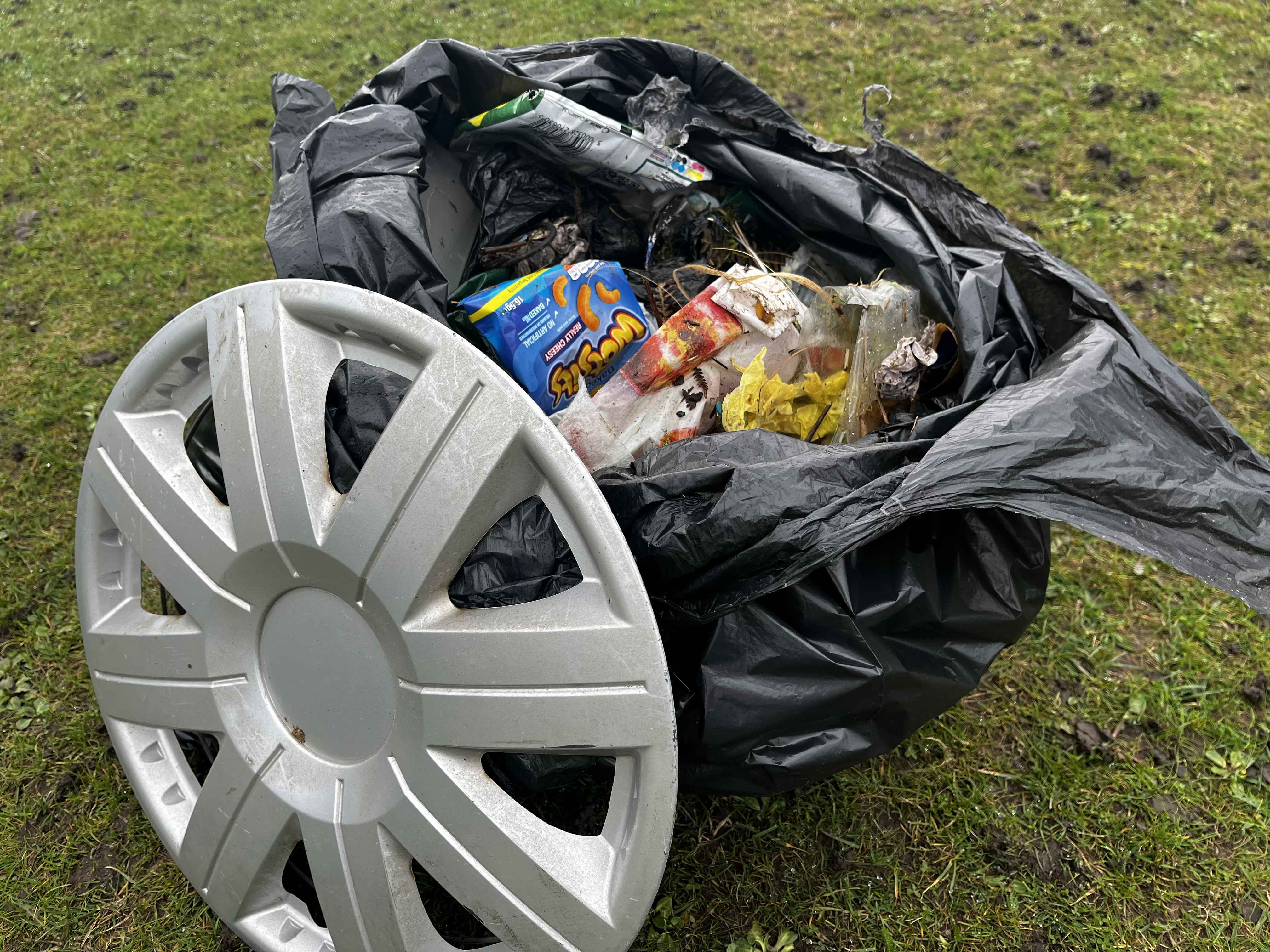 A black bag filled with rubbish collected from parts of Dartmoor