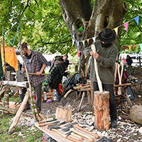 Two men working wood