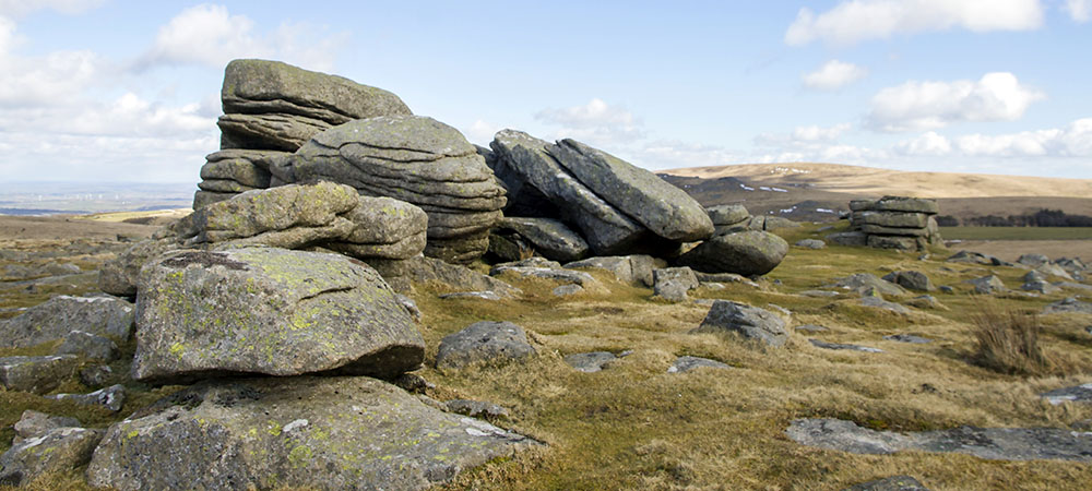 Row Tor and moorland view with patches of snow