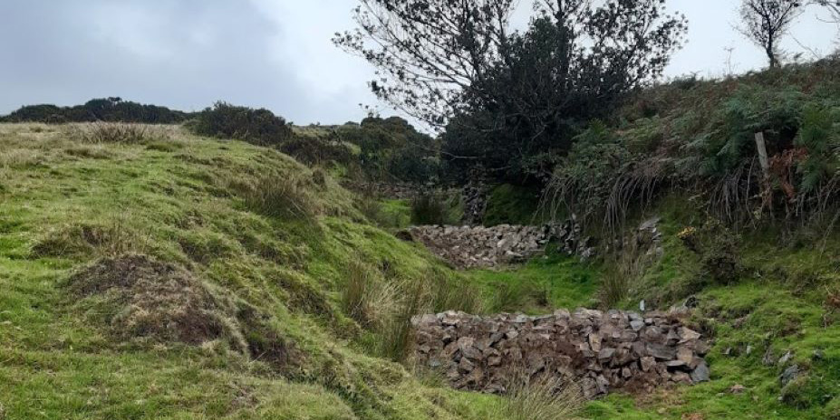 Tiered stone dams at Dean Moor