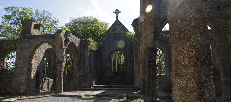 Inside a ruined church on a sunny day