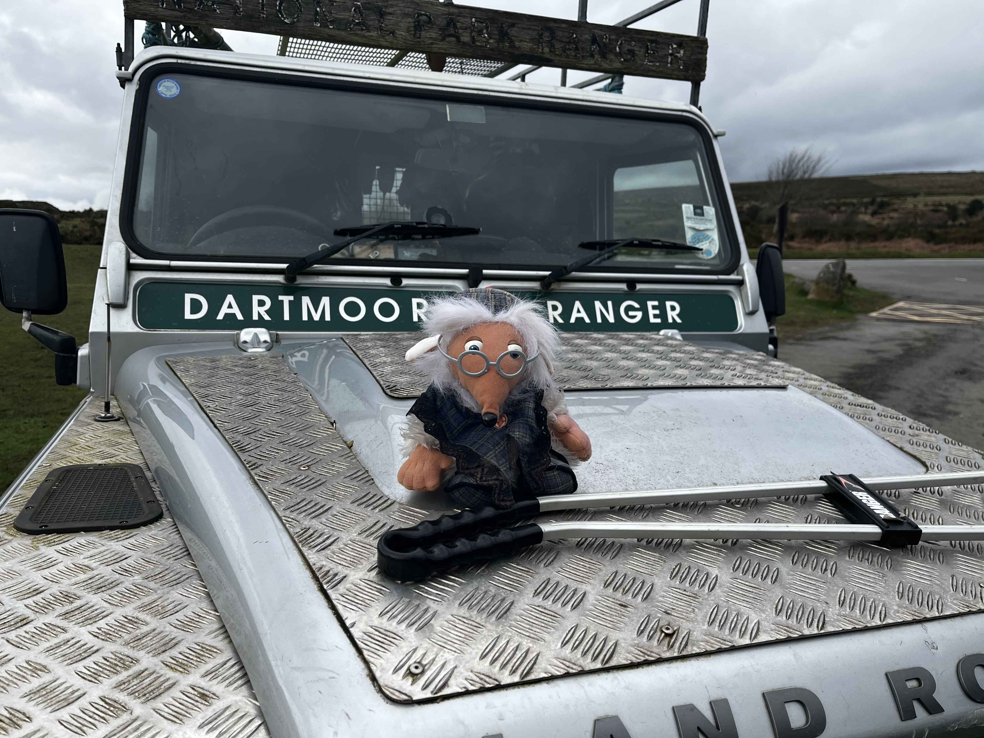 A toy of the Womble Great Uncle Bulgaria sits on top of a Dartmoor Ranger vehcile 