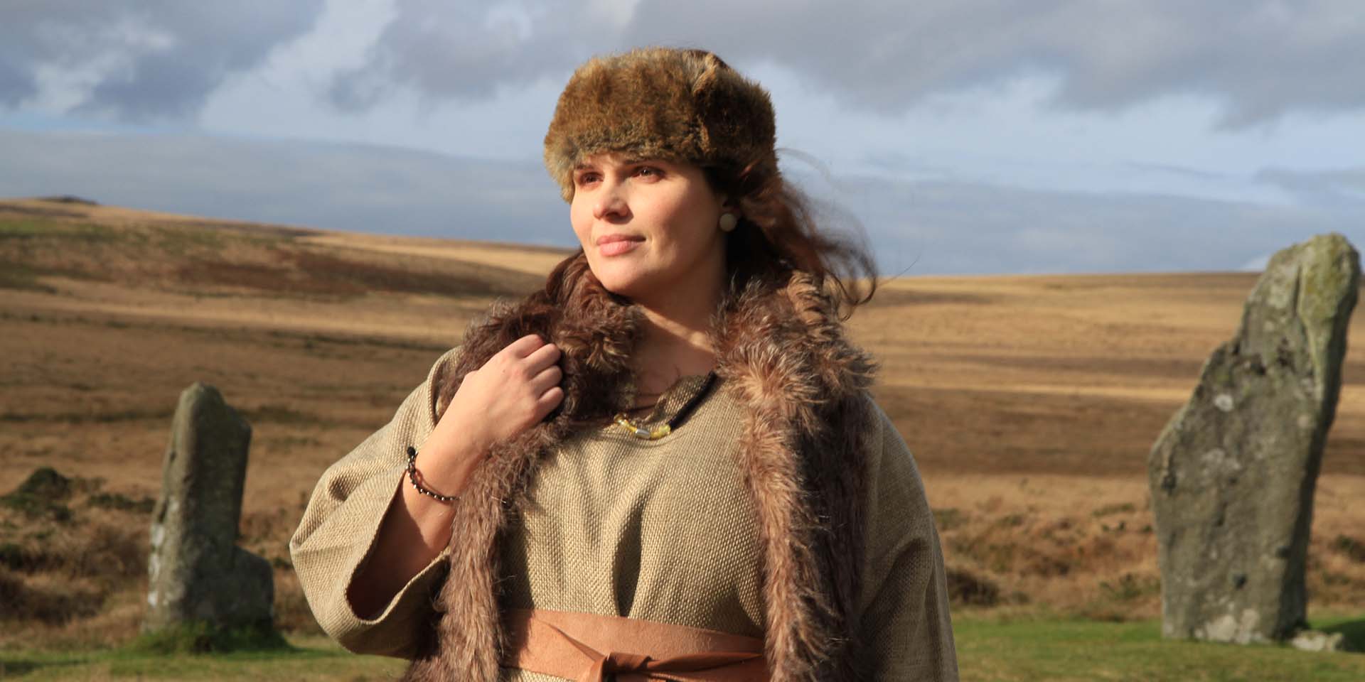 Young woman dressed in Bronze Age clothing and jewellry