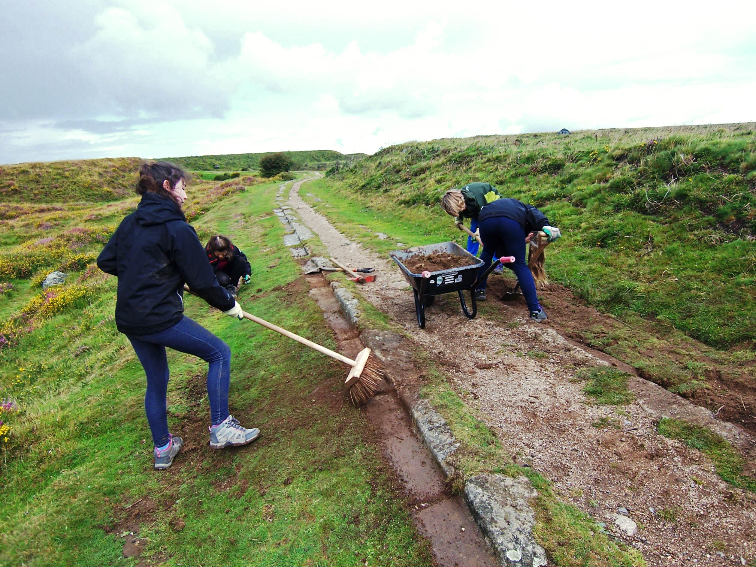 Junior Rangers clearing tramway Junior Rangers clearing the Haytor tramway