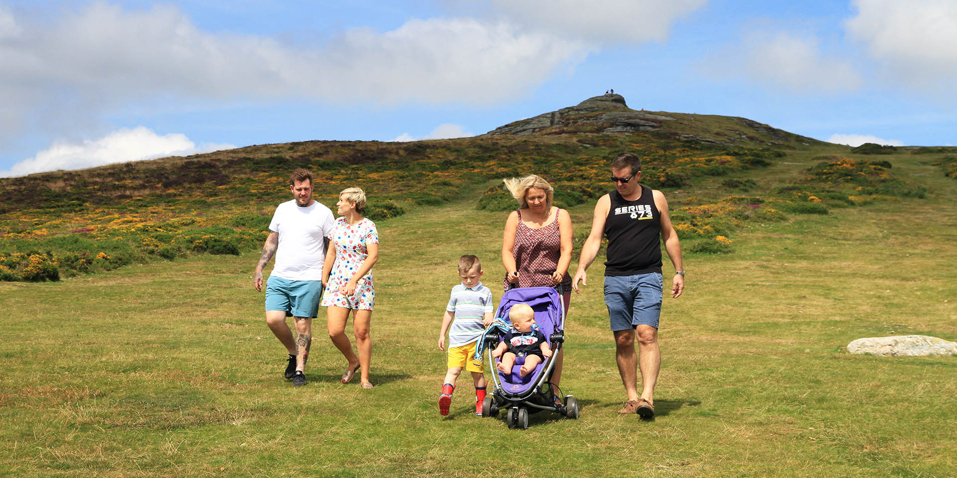 Family walking down from Haytor Rocks