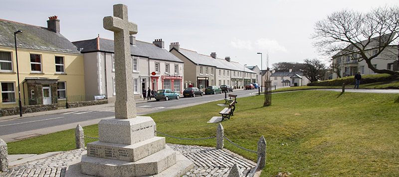 Memorial and shops along main road in Princetown