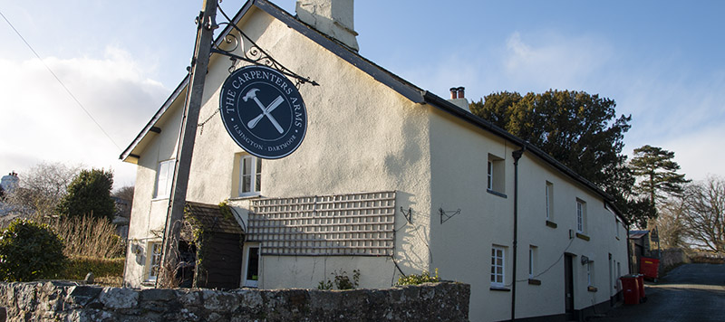 The Carpenters Arms sign outside pub