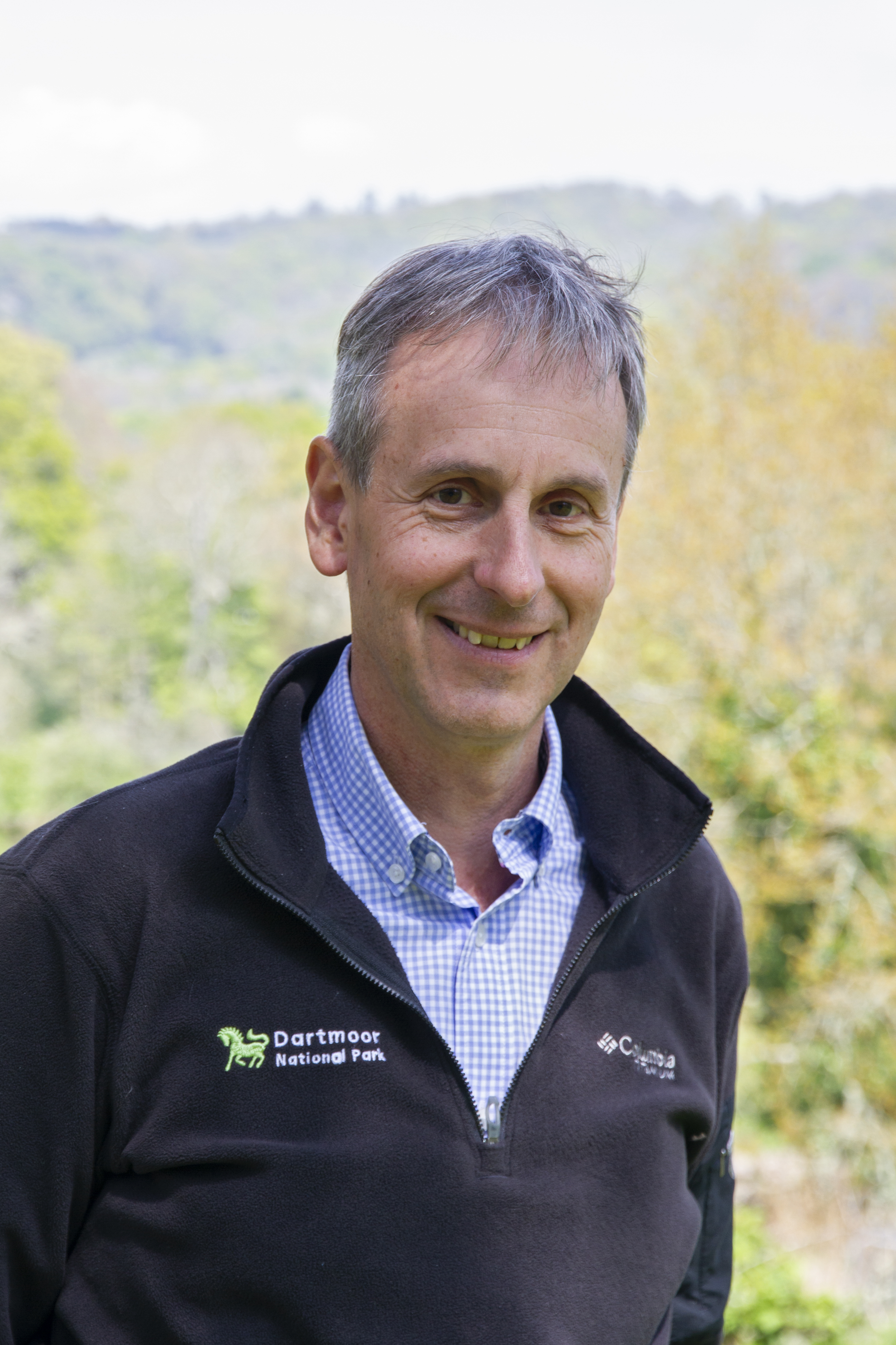 Kevin Bishop Chief executive of Dartmoor National Park, standing in the grounds of Parke