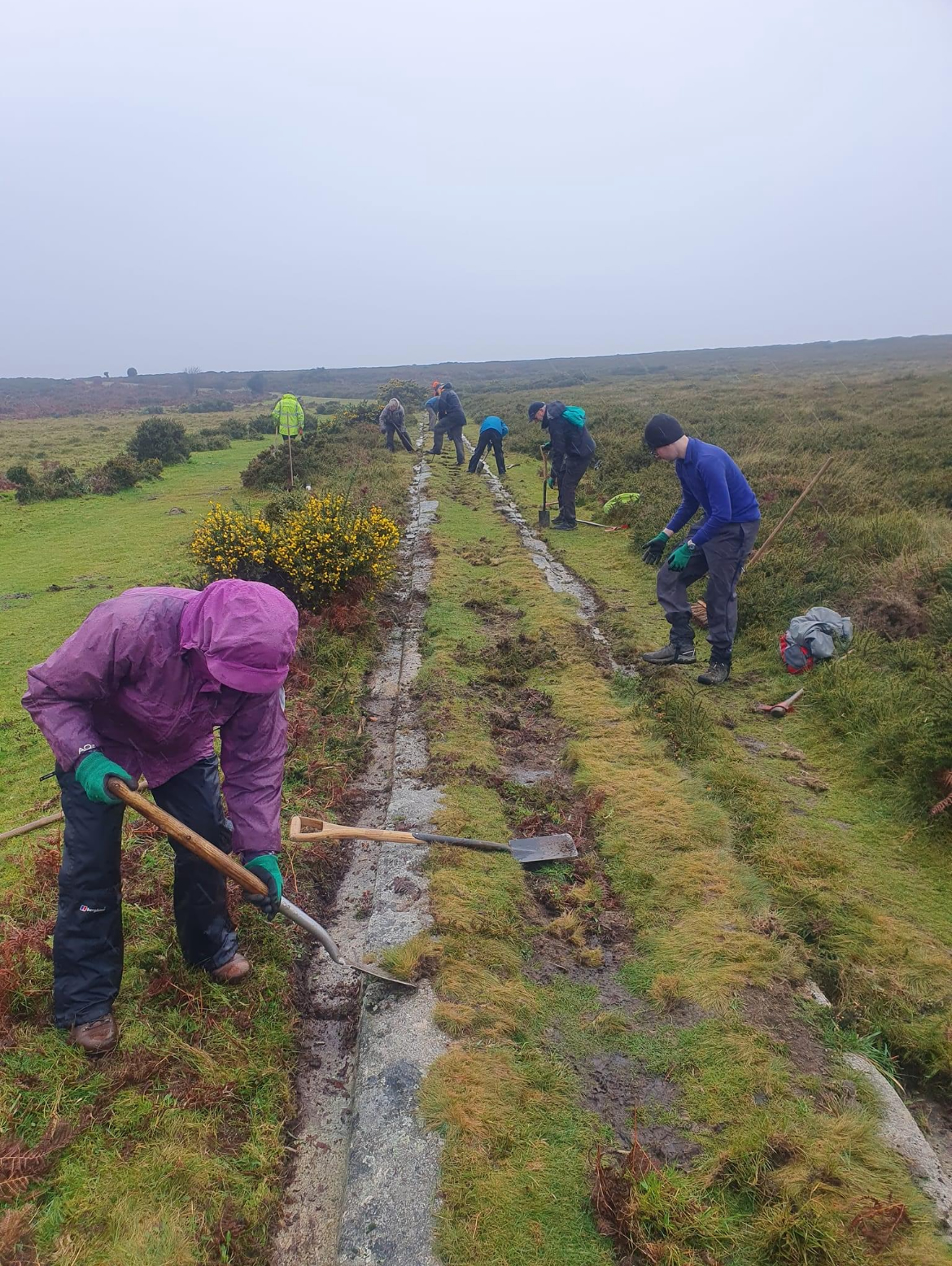 Volunteers working on the granite tramway on Dartmoor