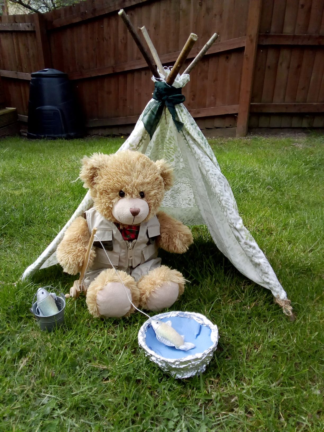 Teddy in a wigwam fishing