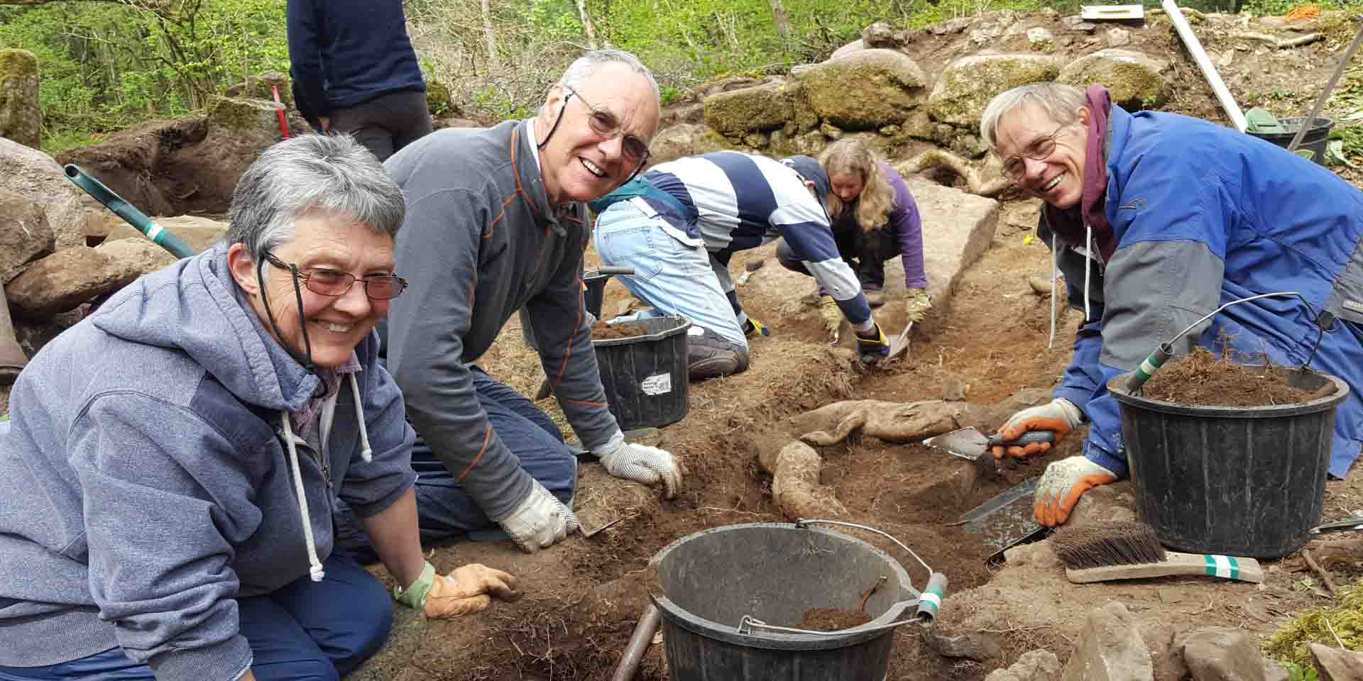 Volunteers digging in the trench at Vinnimore