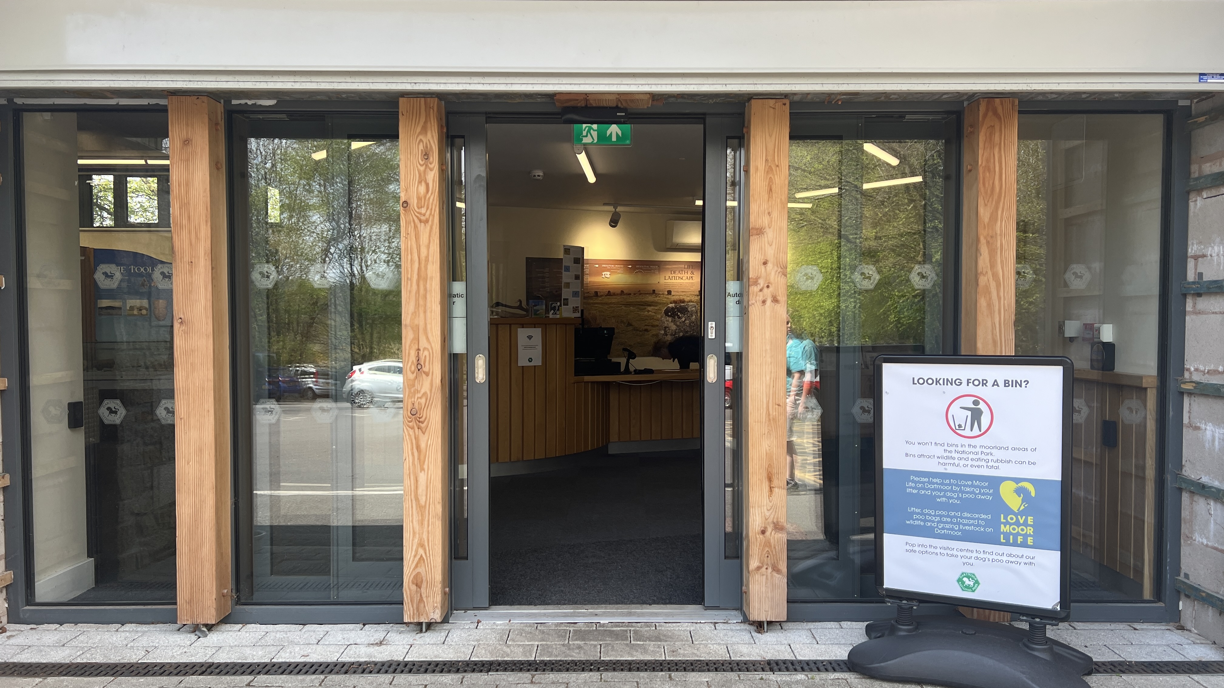 Close up of open doors into Postbridge Visitor Centre