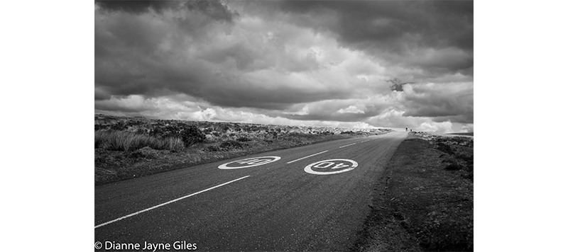 Moorland road with 40mph sign